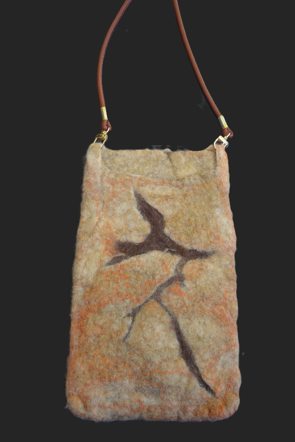 Cracked crossbody bag, reverse view with branch-like felted design