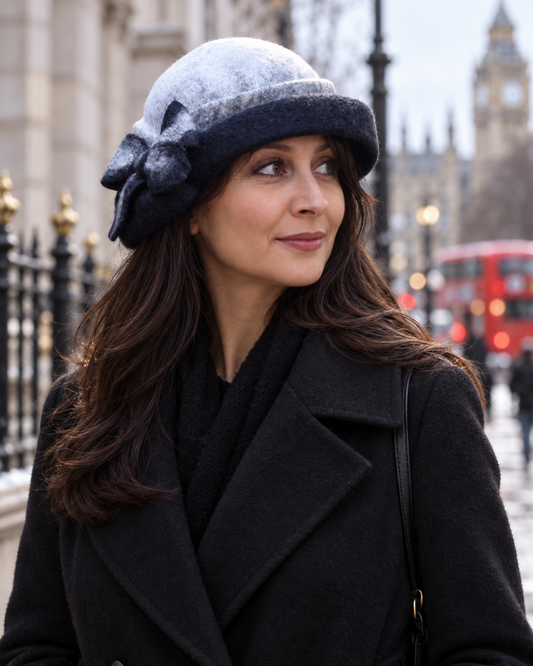 Black and ivory asymmetric felted hat styled on model in London