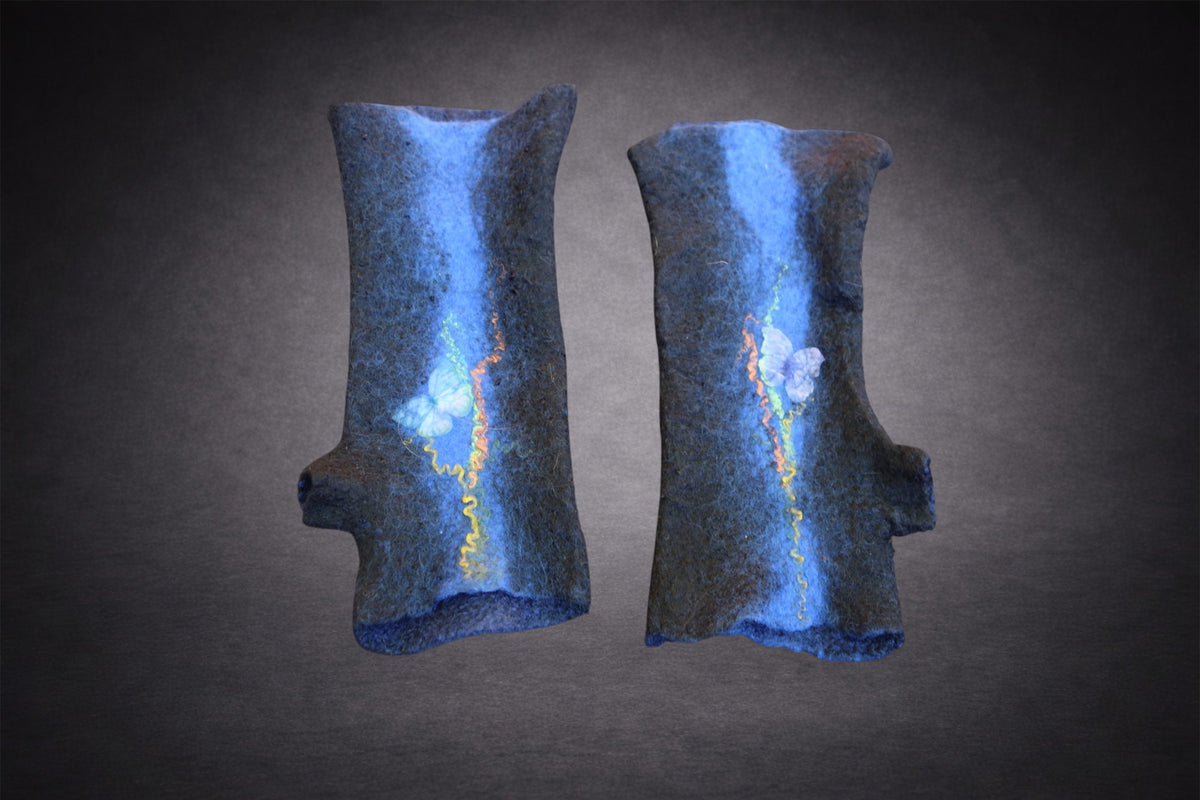 Deep blue hand-felted fingerless gloves with cobalt stripe, butterfly details and colorful fiber accents