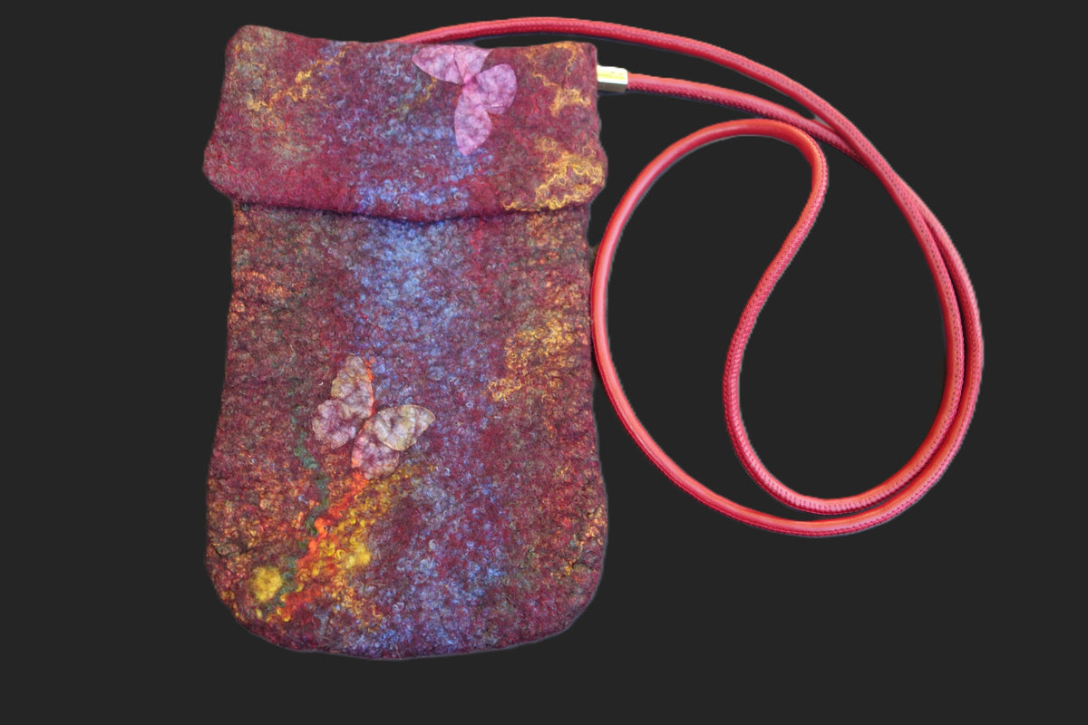 Butterfly Fire hand-felted crossbody bag, front view with red strap