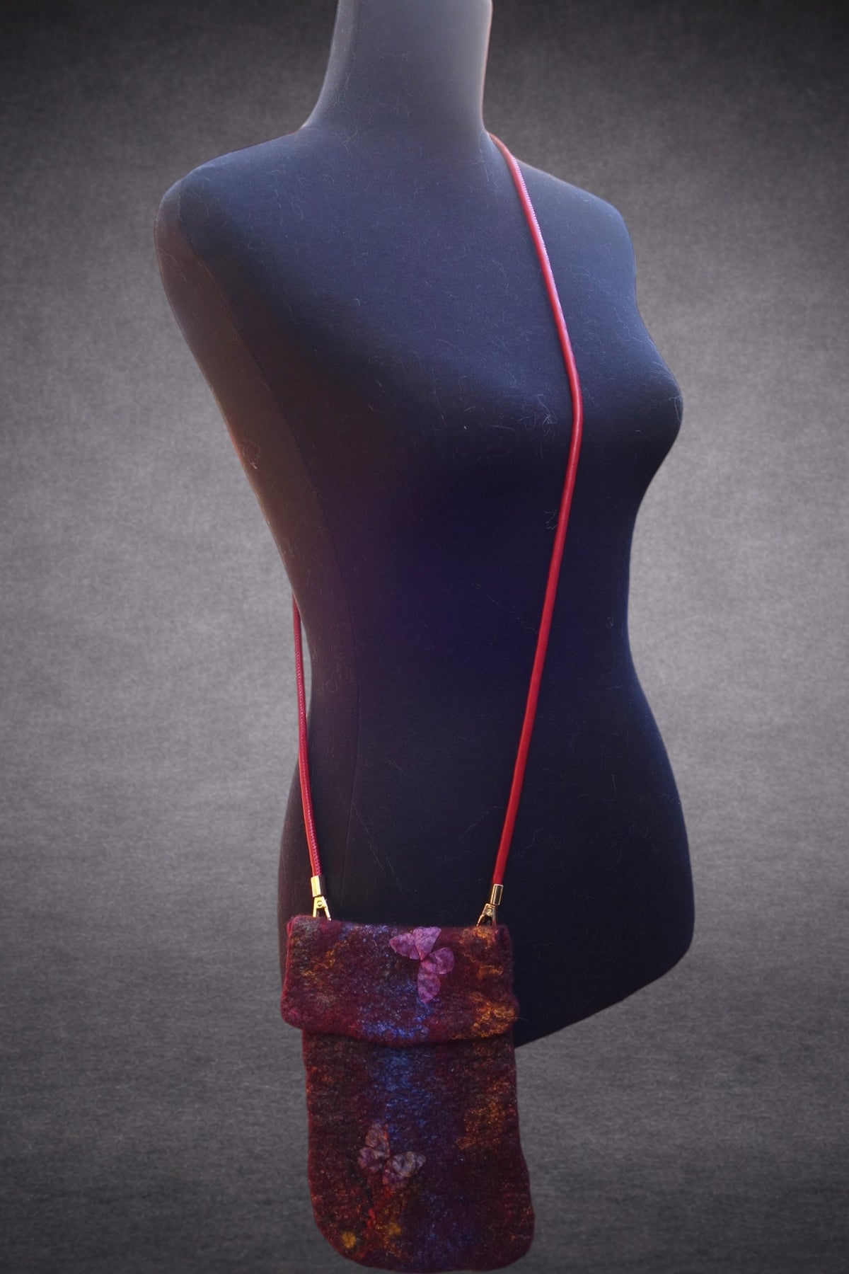 Butterfly Fire hand-felted crossbody bag shown on mannequin