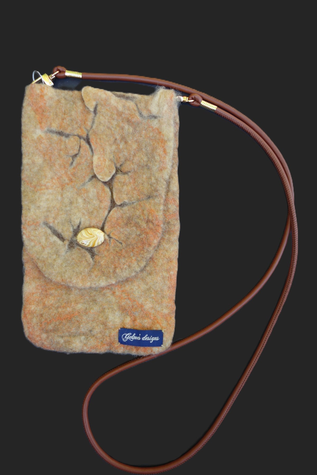 Cracked hand-felted crossbody bag, front view with brown strap