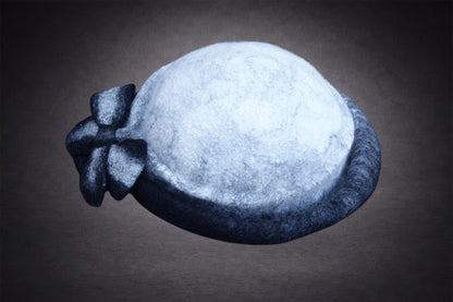 Black and ivory asymmetric hand-felted hat, product view
