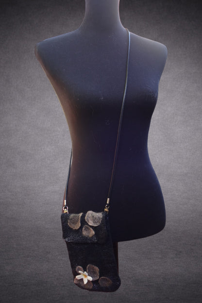 Beauty Through the Cracks in the Stone crossbody bag shown on mannequin