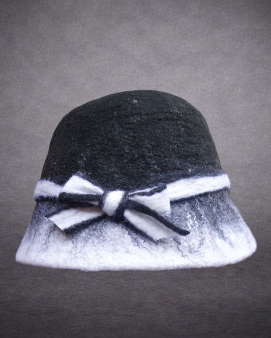 Black and white soft hand-felted bucket hat with bow front view