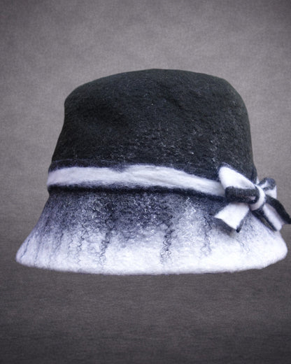 Black and white soft hand-felted bucket hat side view