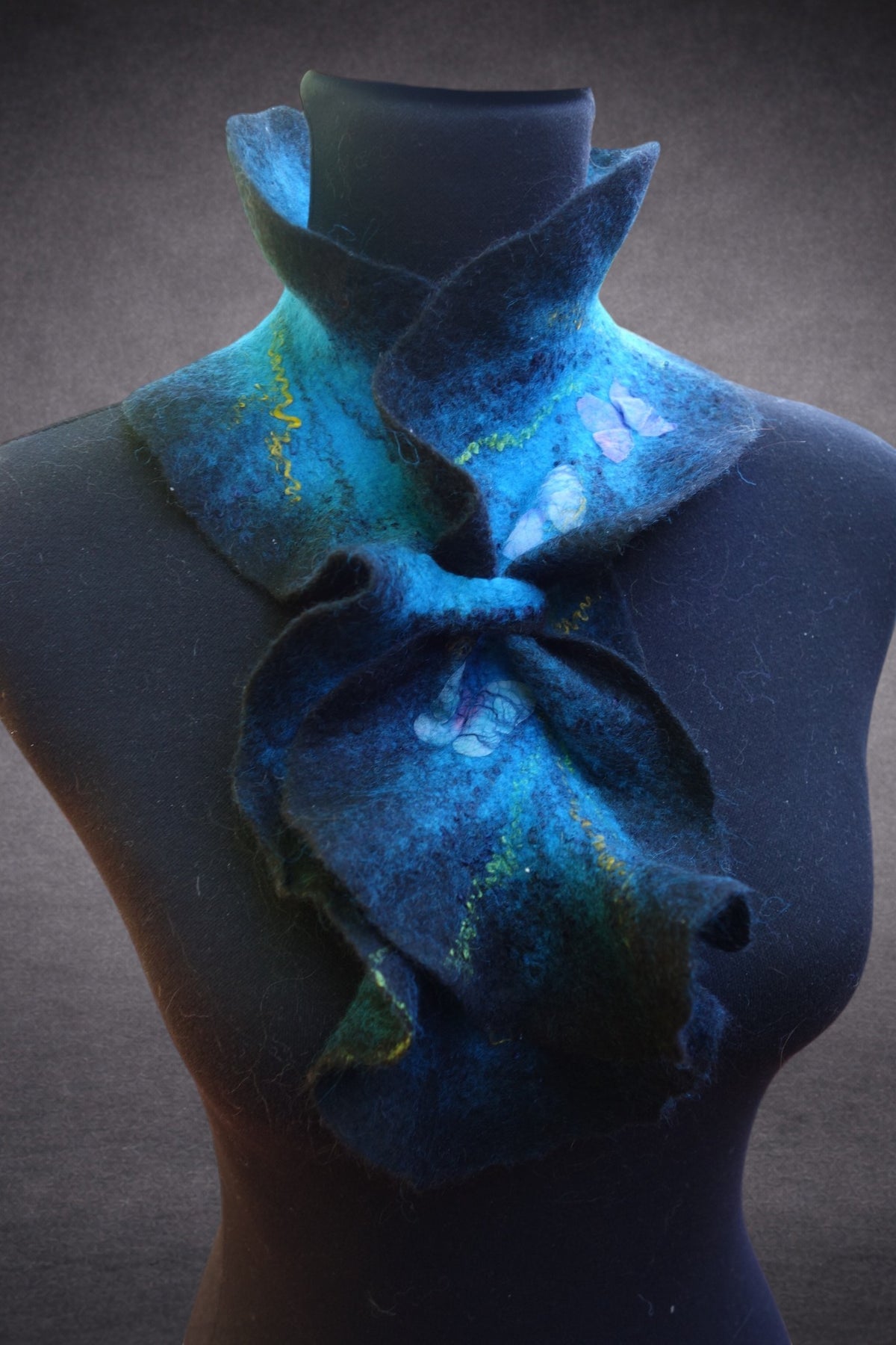 Blue sculptural scarf styled view
