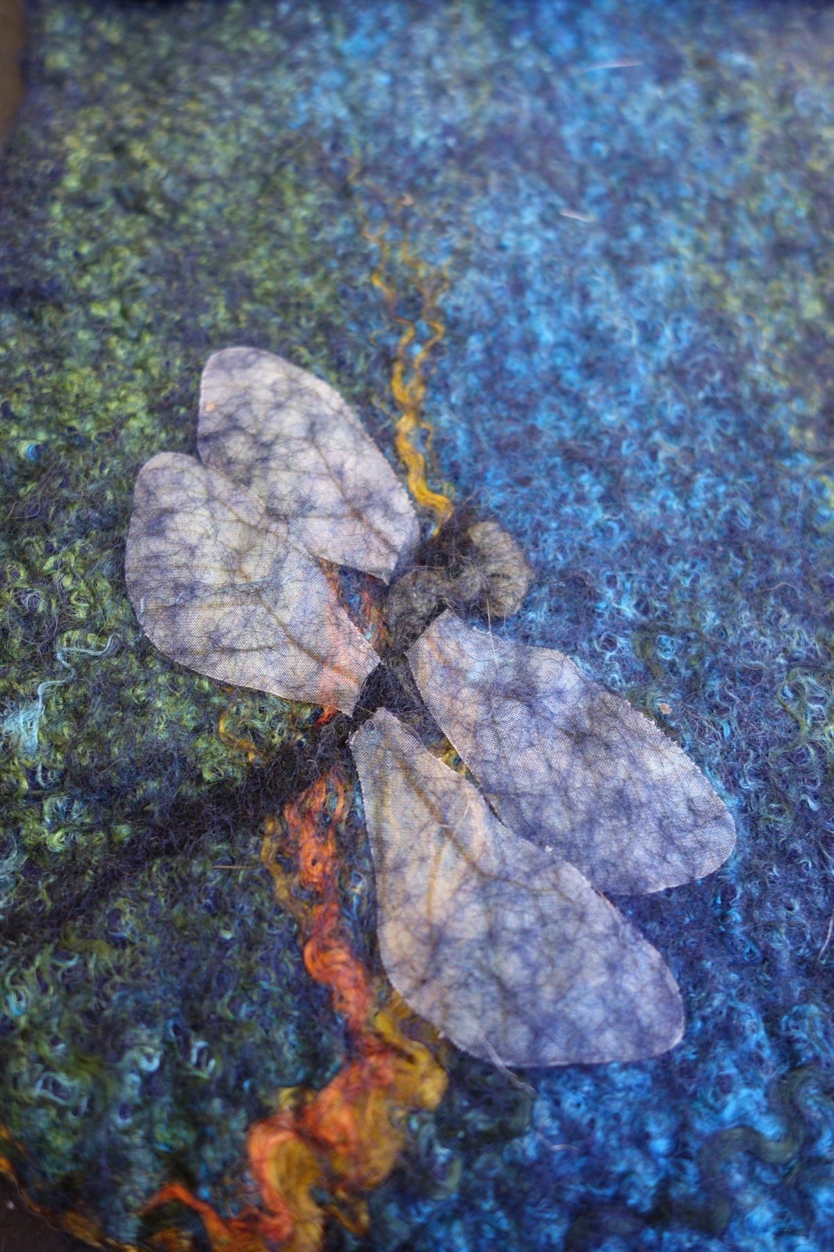 Close-up of felted dragonfly detail on Dragonflies at the River crossbody bag