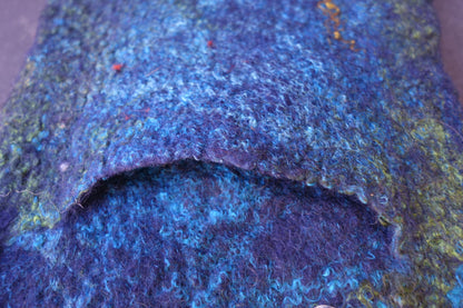 Close-up of hand-felted texture and back phone pocket on Dragonflies at the River bag