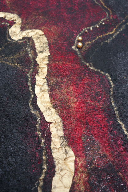 Close-up of gold nuno-felted silk detail on Fire in the Night poncho