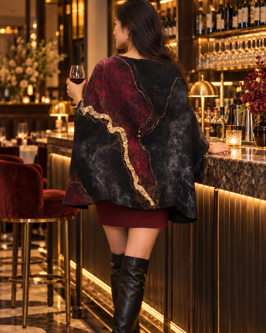 Fire in the Night reversible hand-felted poncho, back lifestyle view