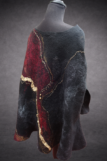 Fire in the Night reversible hand-felted poncho on mannequin, back view