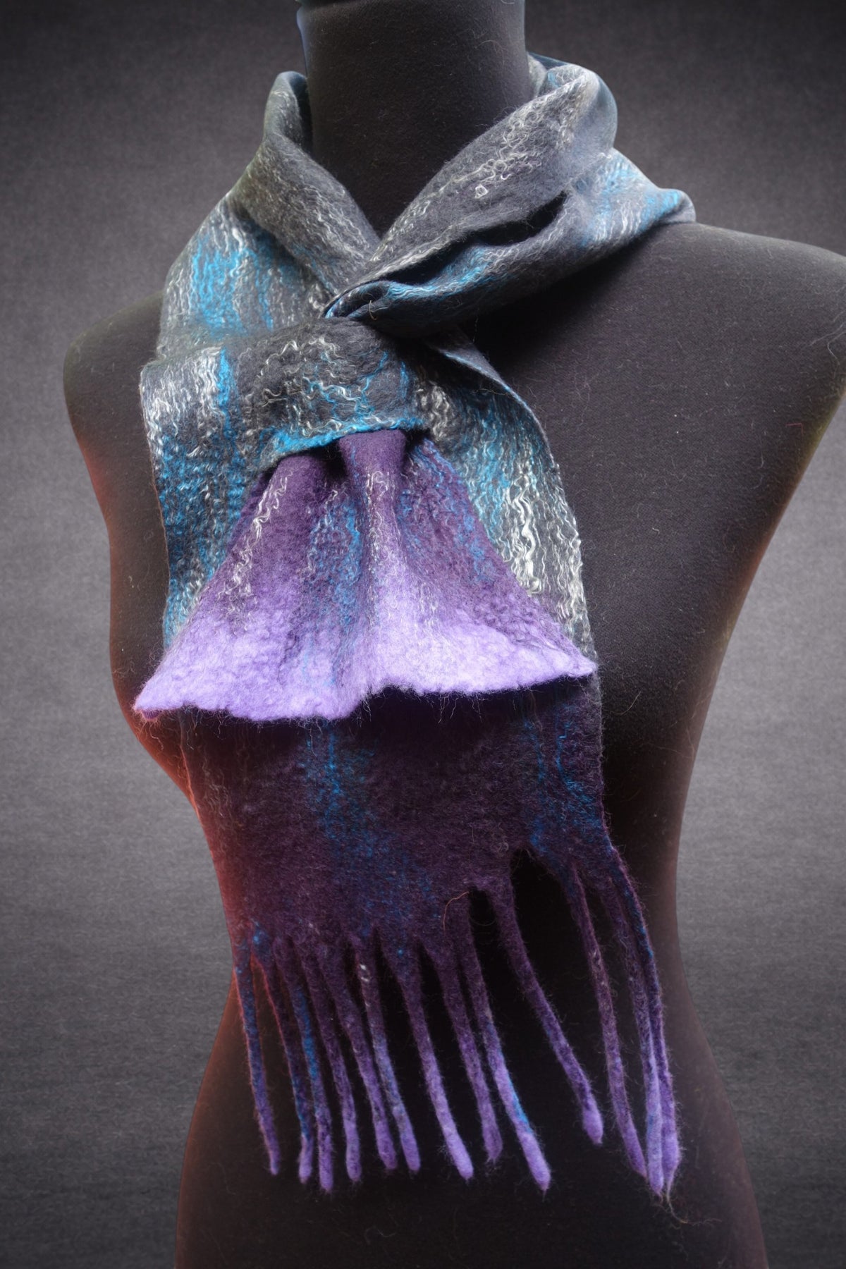 Hand-felted merino wool scarf styled on mannequin