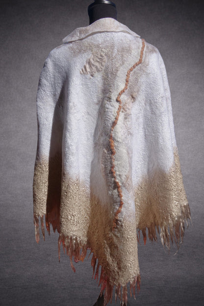 Ivory Sands reversible nuno-felted poncho on mannequin, back view