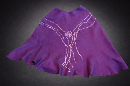 Northern Lights reversible poncho laid flat, alternate side