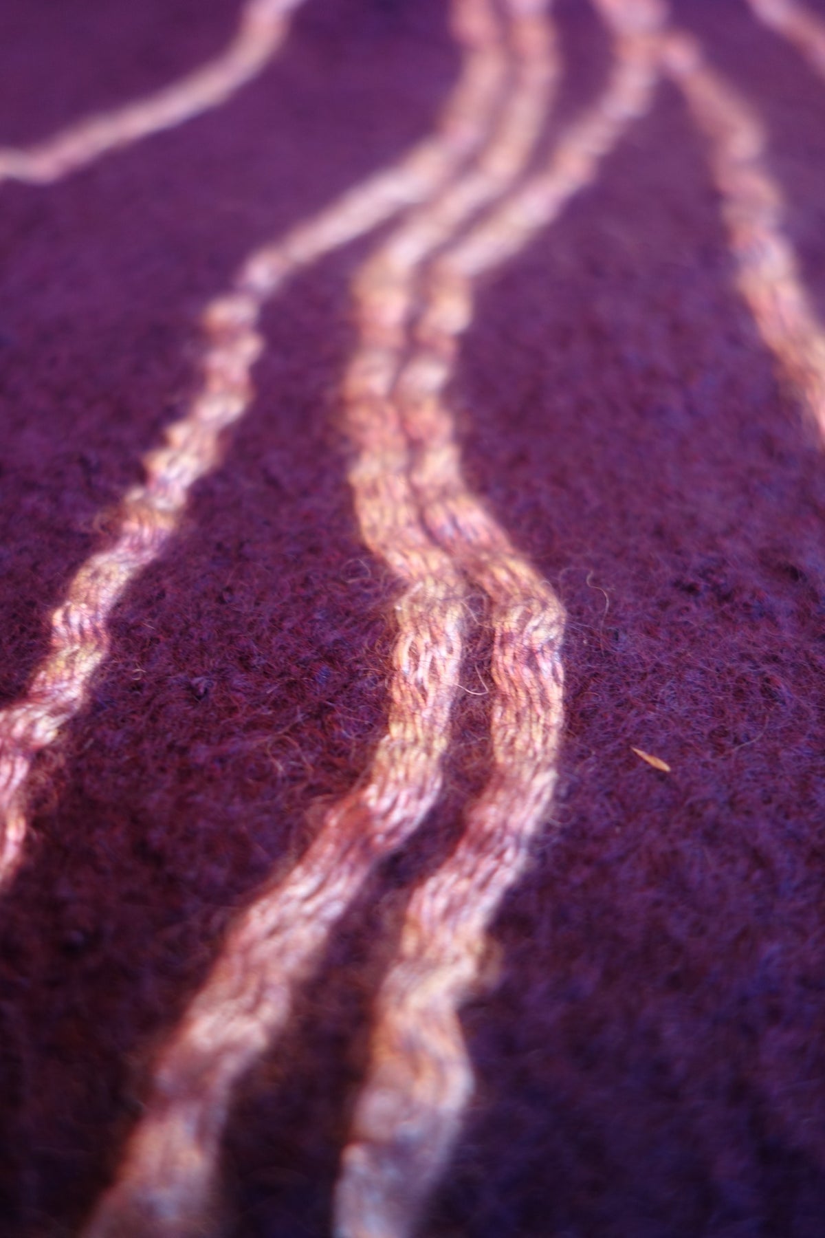 Close-up of yarn texture on Northern Lights reversible poncho