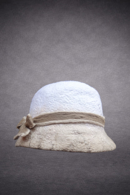 Ivory and beige hand-felted bucket hat with layered band and bow