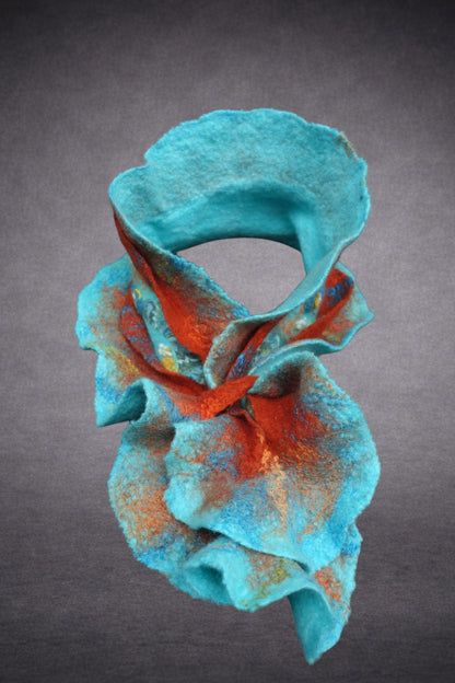 Turquoise and terracotta sculptural scarf detail