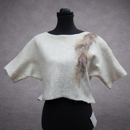 Ivory and taupe handmade felted wool top on mannequin, back view