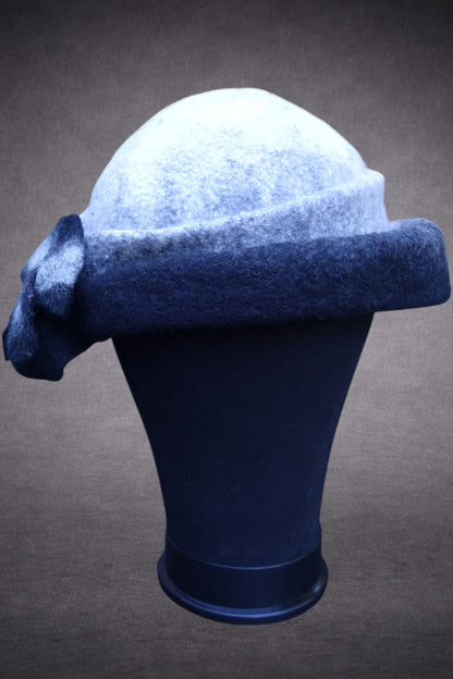 Black and ivory asymmetric felted hat, side and back mannequin view